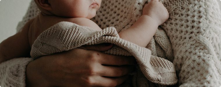 bébé veut les bras