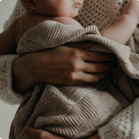 bébé veut les bras